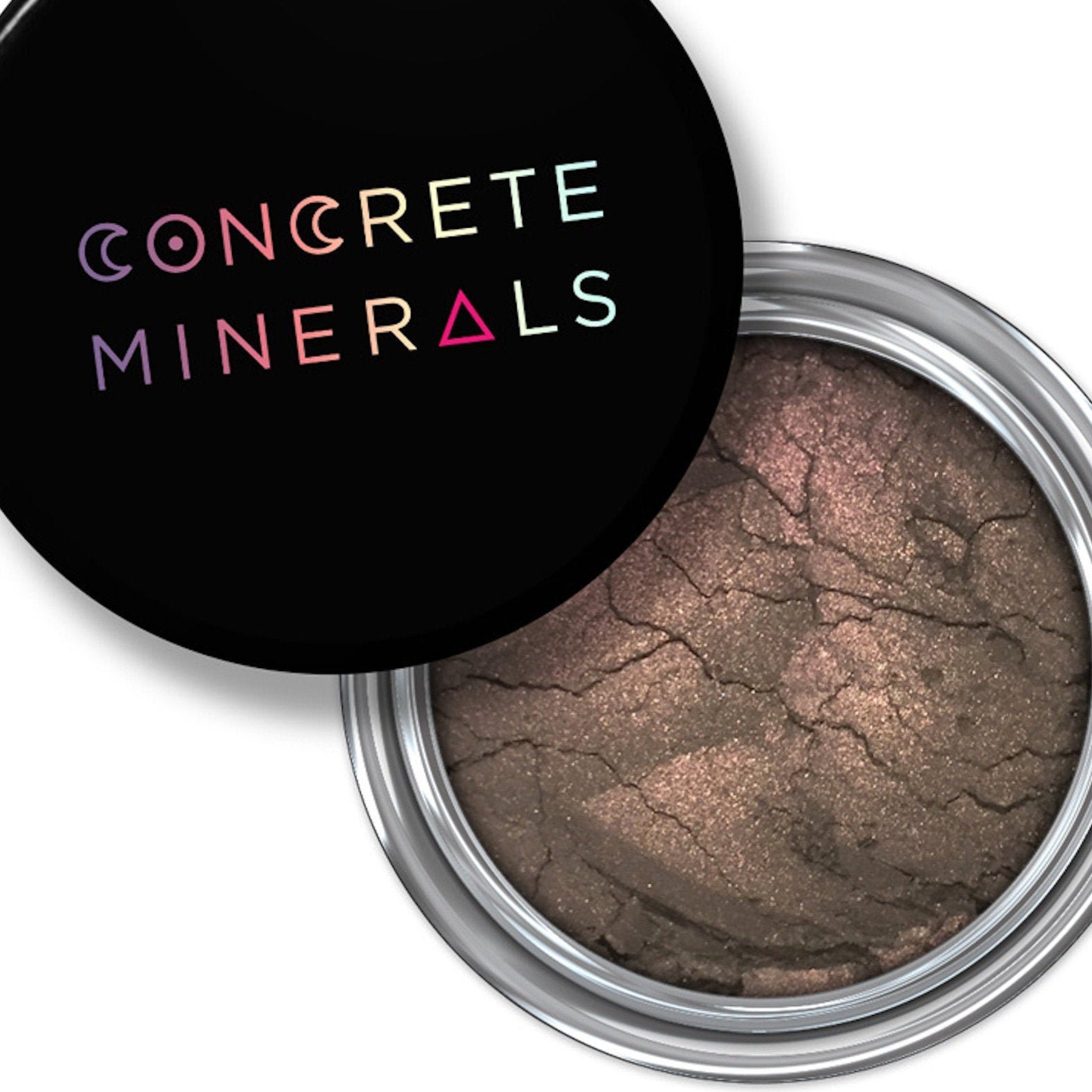 Mineral eyeshadow, brown powder with cracked texture, Concrete Minerals branding on black lid