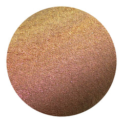 Eye shadow swatch with gold, red, and copper color shifting with a textured finish