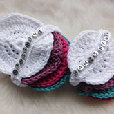 Makeup removal pads, white crocheted cotton, multi-color pads stacked, "NAMZSHINE" text