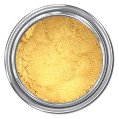 Gold powder in a silver metal container, with a textured surface and round shape