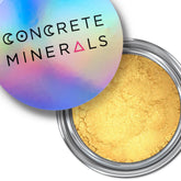 Eyeshadow metallic gold powder in a silver jar with Concrete Minerals logo on lid