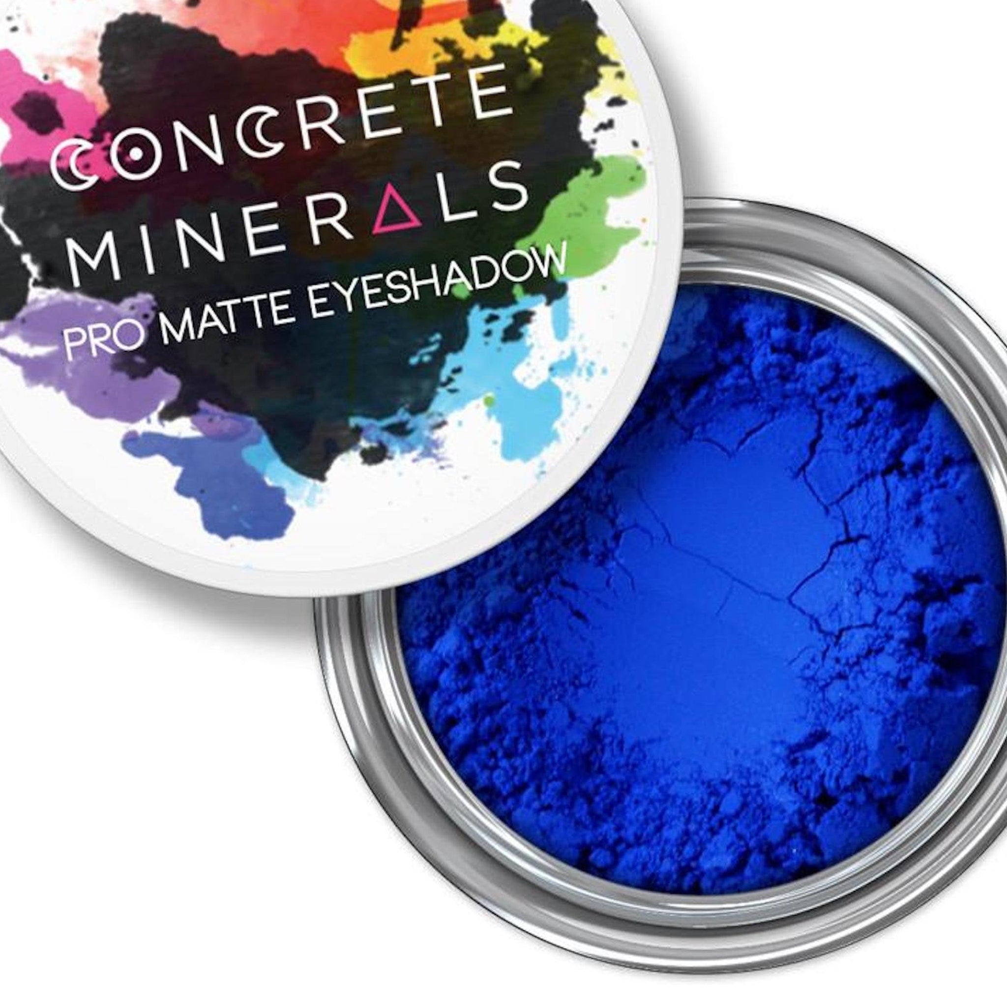 Eyeshadow powder, blue matte color, in silver metal container, Concrete Minerals text visible