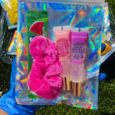 Lip gloss bundle in iridescent bag with pink scrunchie and Broadway lip gloss tubes
