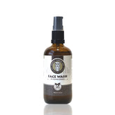 Face wash bottle, brown glass with black pump, Sweyn Forkbeard label visible