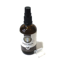 Face wash bottle with brown glass, black pump, and white label, "Sweyn Forkbeard" brand
