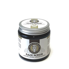 Face scrub jar with silver lid, black contents, and Sweyn Forkbeard label