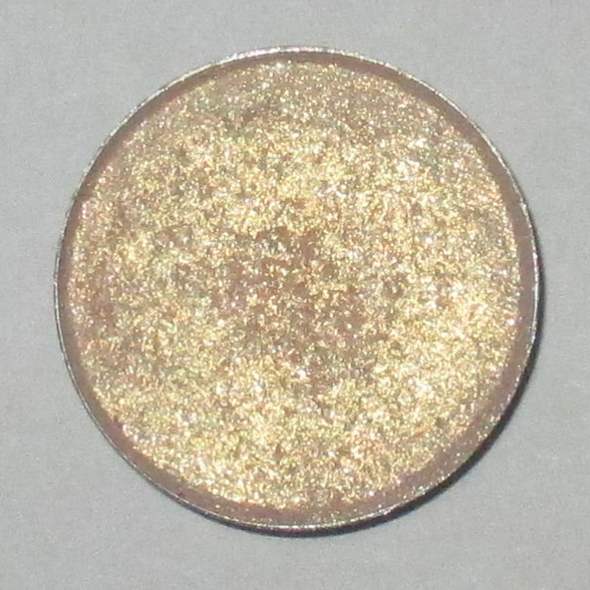 Magic Dance Eye Shadow Palette featuring 12 vibrant matte and shimmer shades in a sleek black compact