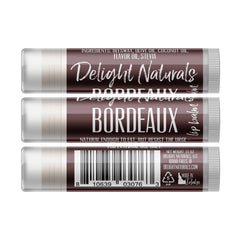 Lip balm tubes with white and brown packaging, Delight Naturals Bordeaux label, for external use only