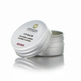 Lip balm in silver metal tin with Annacare label and "Hydrate" text visible