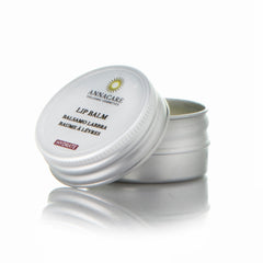 Lip balm in silver metal tin with Annacare label and "Hydrate" text visible