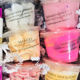 Skin care sample pack with clear plastic containers, various colors, Carolina Organics text visible