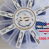 Eyelash extensions in dark color, plastic container, Kimeyelashes brand name visible