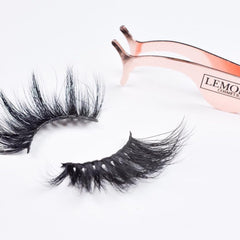 False eyelashes with black synthetic fibers and rose gold tweezers, Lemon Cosmetics brand