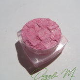 Loose eyeshadow, pink shimmer, textured surface in clear jar, Dazzle Me brand