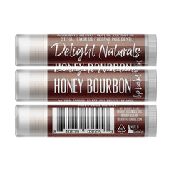 Lip balm tubes with brown and white labels, Delight Naturals Honey Bourbon flavor, barcode visible