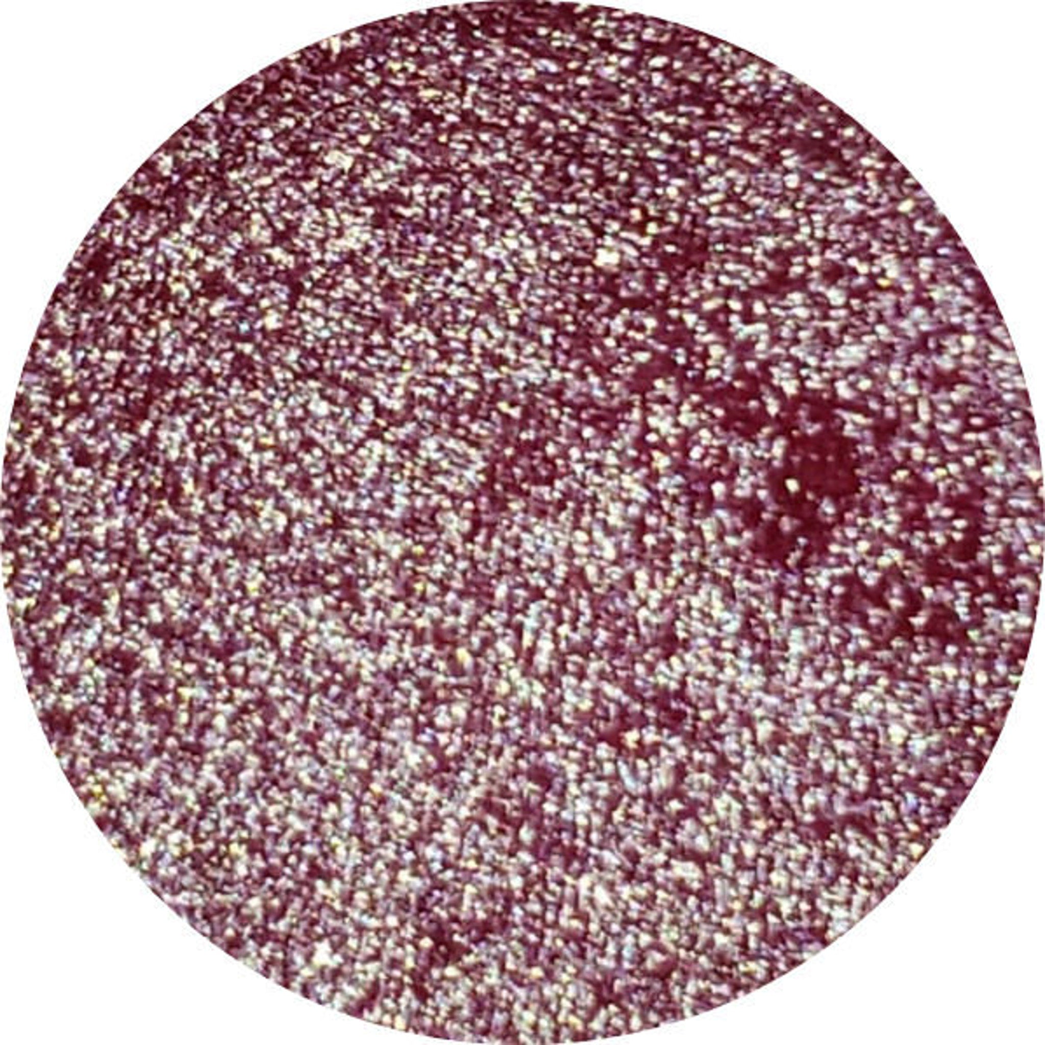 Razzmatazz Eye Shadow Palette featuring 12 vibrant matte and shimmer shades in a sleek black compact