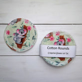 Washcloths with koala print, light green fabric, and white stitching around edge