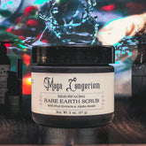 Skin care scrub jar, black lid, white label with text, water splash background