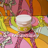 Eye makeup container with white lid, gold handle, and floral pattern on green band, Yardley brand
