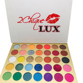 Open 35-color eyeshadow palette with matte and shimmer shades in warm neutrals, cool tones, and bold hues, includes mirror