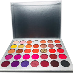 Side view of 35-color eyeshadow palette with matte and shimmer shades in a sleek black case
