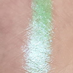 Close-up of the Globetrotter Eye Shadow Palette showing vibrant matte and shimmer shades in earthy tones