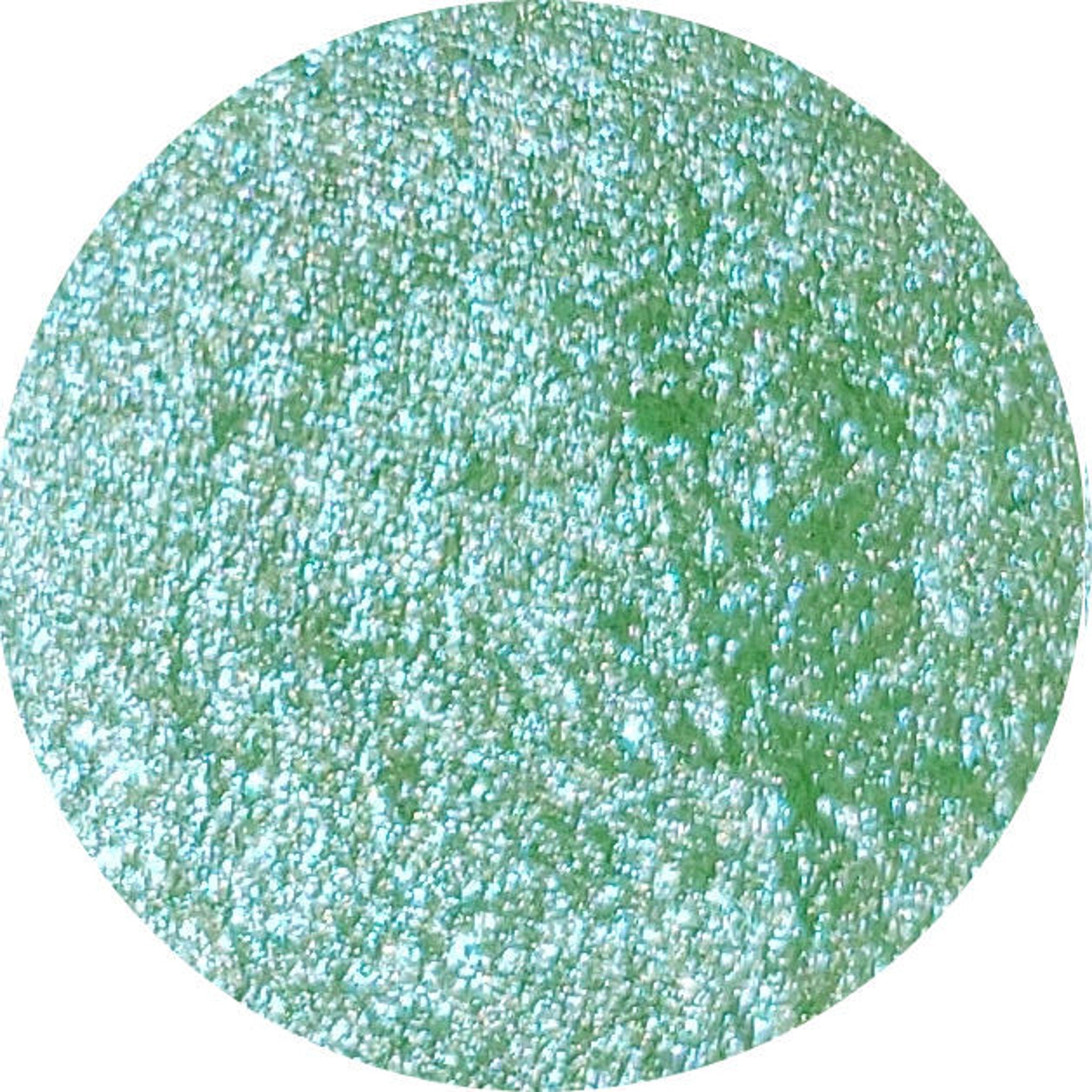 Globetrotter Eye Shadow Palette featuring 12 vibrant matte and shimmer shades in a sleek black compact