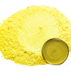 Close-up of shimmering golden yellow mica pigment powder with fine sparkling particles for eye shadow