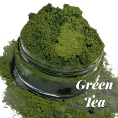 Single pan of matte green tea eyeshadow with smooth powder texture in minimalist black compact