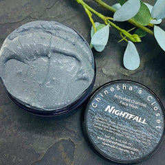 Activated charcoal face mask, gray jar with dark gray mask, Chineshasclosetllc Nightfall label visible