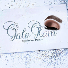 Close-up of Alluring Faces eyeshadow palette showing shimmering bronze and plum shades with smooth, blendable texture