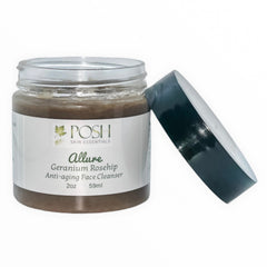 Face cleanser jar with glass, brown contents, and dark cap, POSH brand visible