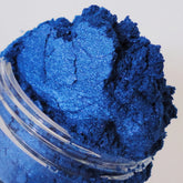 Mineral eyeshadow, deep blue shimmer powder in clear jar, Crush brand