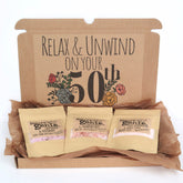 Bath & Body Gift Sets, brown cardboard box with floral design, Nature's Genie products inside