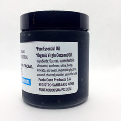 Facial scrub jar, black glossy container, white label with text, charcoal ingredient