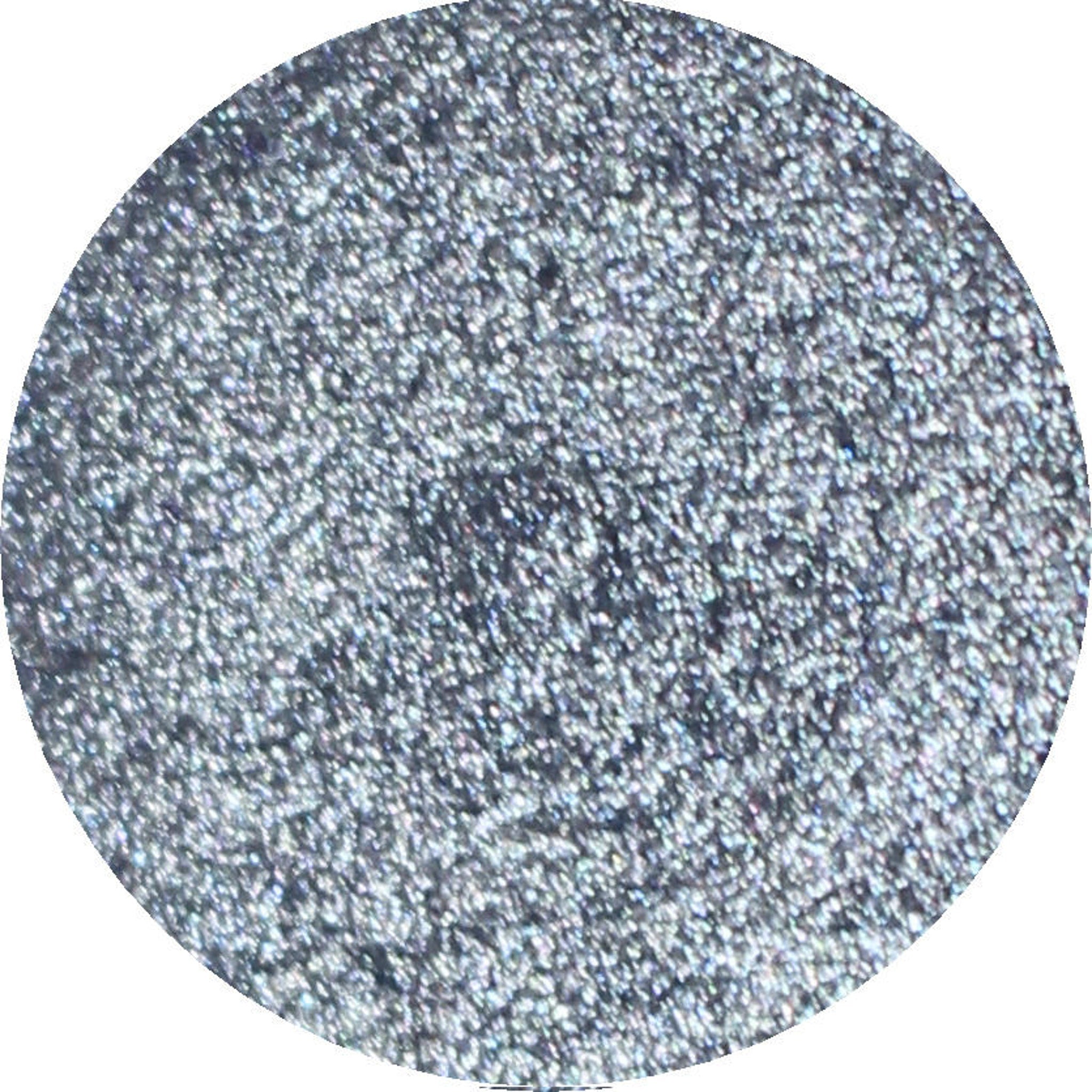 Smiley Eyeshadow Palette featuring 12 vibrant matte and shimmer shades in a sleek black compact with gold lettering