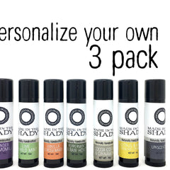 Lip balm gift set with black caps, white tubes, and MADE IN THE SHADY text