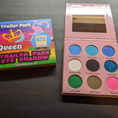 Eyeshadow palette with pink case, blue and colorful eyeshadow shades, Jolene Sugarbaker brand