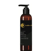 Facial cleanser bottle, brown glass, black pump, with "Goddess L" text and label