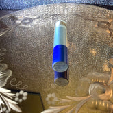 Eye shadow, blue and silver cylindrical tube, Max Factor Marine Smokey label visible