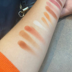 Close-up of Virginia Tech Eye Shadow Palette showing matte and shimmer shades in maroon, orange, and gold