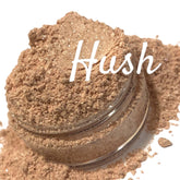 Pink beige shimmer eyeshadow with loose powder texture, Crush Mineral "Hush" text visible
