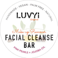 Facial cleanse bar with white background, black text, and LUVYI brand name in a circular design.