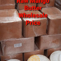 Close-up of golden unrefined mango butter in a glass jar with creamy, velvety texture and natural fruit scent