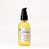 Facial cleanser bottle, yellow glass, black pump top, GingerChi label