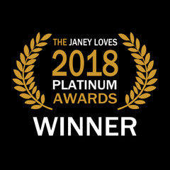 Award logo with gold laurel wreath, white text on black background, "The Janey Loves 2018 Platinum Awards Winner