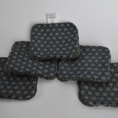 Coasters with geometric pattern, blue and white accents, and gray trim, Made in Aveyron France