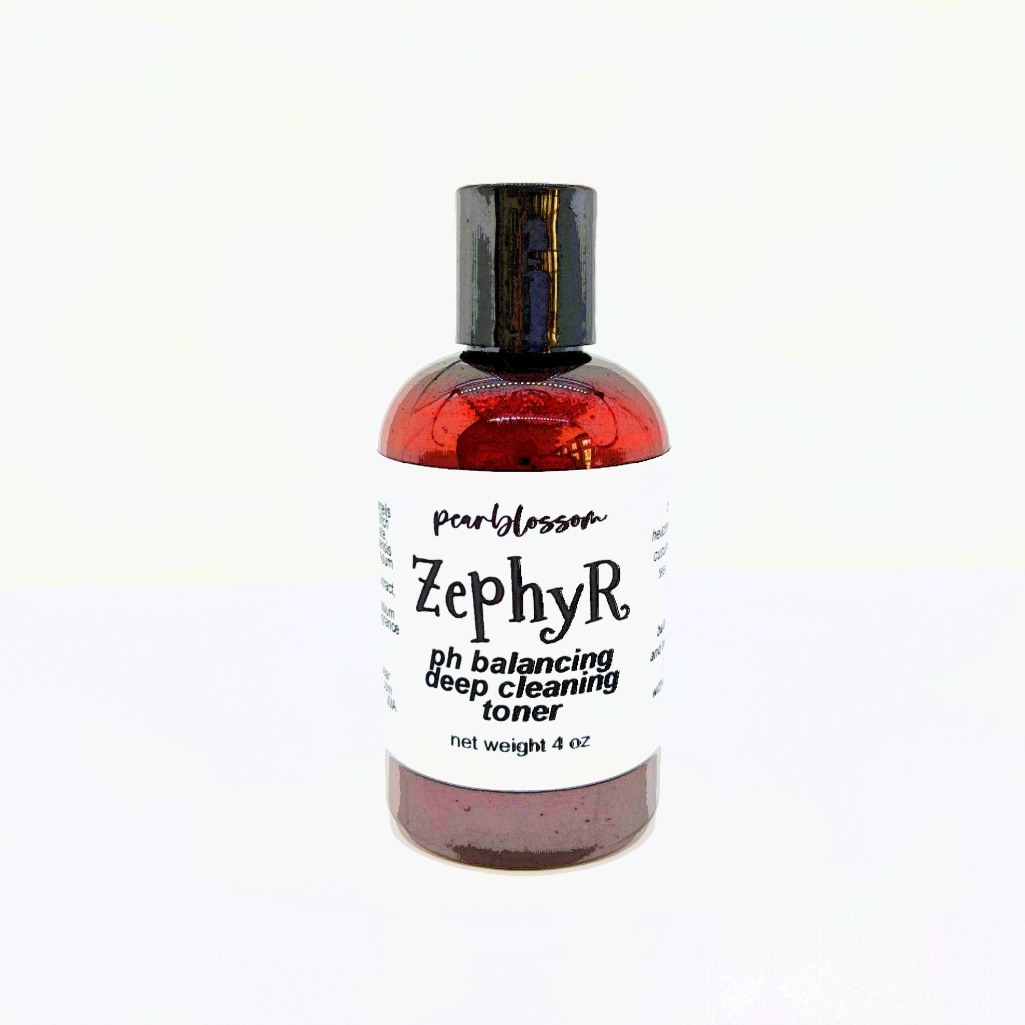 Toner bottle with dark cap and red-tinted glass, labeled Zephyr, white label with text