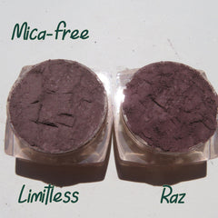 Hand applying vegan matte mineral eyeshadow with brush, showcasing loose pigment texture and blendability on skin