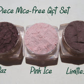 Three small jars of vegan matte mineral eyeshadow in loose powder form, displayed on a neutral background.